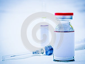 vaccination bottle with seringue without name on it