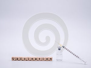 Vaccination with bottle and syringe