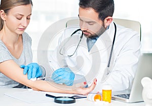 Vaccination. Flu shot. Doctor injecting flu vaccine to patient`s arm