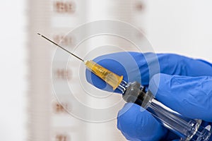 Vaccination with serum and syringe against COVID-19