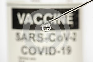 Vaccination with serum and syringe against COVID-19