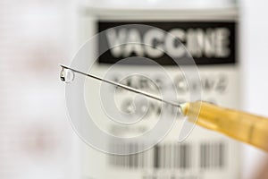 Vaccination with serum and syringe against COVID-19