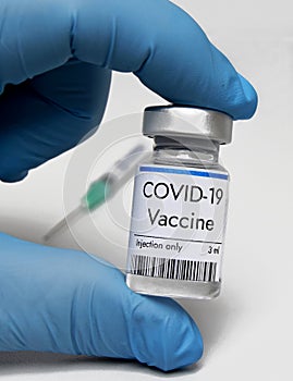 Vaccine against coronavirus COVID-19 in vial at Pfizer research laboratory photo