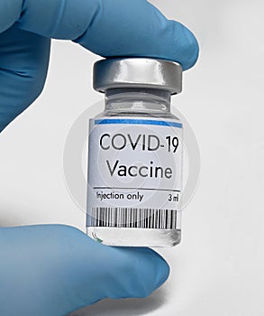 Vaccine against coronavirus COVID-19 in vial at Pfizer laboratory in USA photo