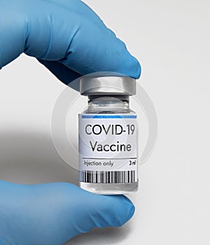 Vaccine against coronavirus COVID-19 in vial at Pfizer laboratory photo