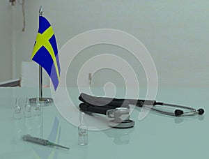 Vaccine COVID 19 on a medical table in the Konungariket Sverige