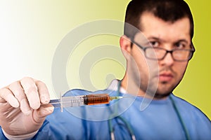 Vaccine for immunization and protection against Coronavirus. The doctor is holding a syringe with Covid19 virus vaccine