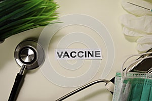 Vaccine with inspiration and healthcare/medical concept on desk background