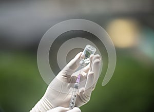 Vaccine and syringe