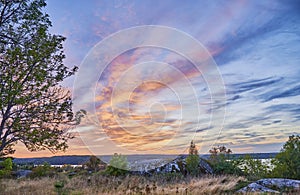 Vacker solnedgÃÂ¥ng frÃÂ¥n frÃÂ¥n toppen av Runsa fornborg photo