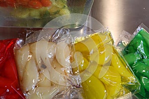 Vacuum bags of fresh vegetables for the storage of food photo