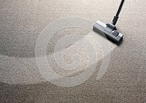 Vacuum Cleaner on a Carpet photo