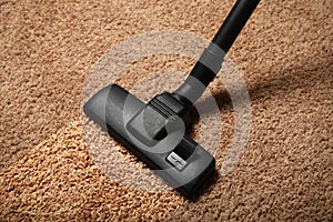 Vacuum cleaner in home. Clean carpet