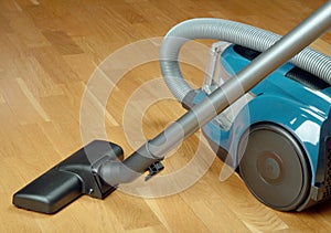 Vacuum cleaner on a oak parquet