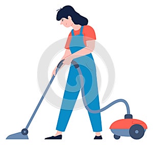 Vacuum cleaning routine. Female professional service worker