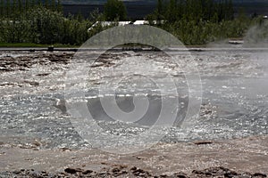 Vacuum crater after the ejecting of the geyser in Iceland photo