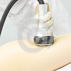 Vacuum massage device. Anti cellulite body correction treatment. Loss weight apparatus. Woman and doctor at medicine salon