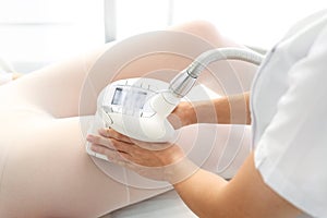 Vacuum massage. A slimming vacuum massage. A woman`s body during a skincare treatment