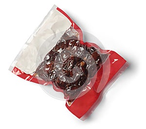 vacuum pack of dates isolated white