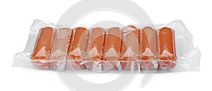 Vacuum pack with sausages isolated on white. Meat product