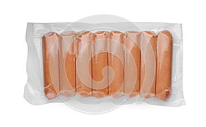 Vacuum pack with sausages isolated on white, top view. Meat product