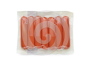 Vacuum pack with sausages isolated on white, top view. Meat product