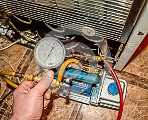 Vacuum pump of the refrigeration unit during repair