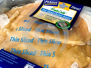 Package of Purdue Thin Sliced Chicken Breast.