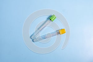 Vacuum tubes for collection and blood samples on blue background with sodium citrate EDTA heparin fluoride anticoagulant for labor