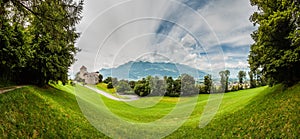 Vaduz castle, city and the Alps in a panorama shot