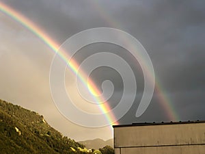 VADUZ, LIECHTENSTEIN, AUGUST 13, 2018 Amazing rainbow after a rain shower