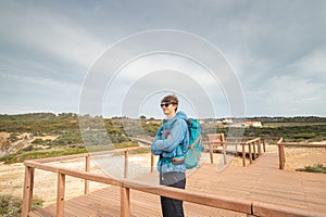 Vagabond wandering the Portuguese countryside on the Fisherman Trail enjoys views of the Atlantic Ocean at a viewpoint. Odemira