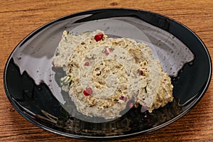 Vagan dietary cusine - mutabal with granet seeds