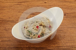 Vagan dietary cusine - mutabal with granet seeds