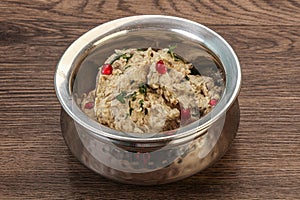 Vagan dietary cusine - mutabal with granet seeds