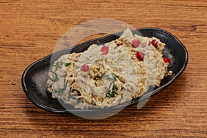 Vagan dietary cusine - mutabal with granet seeds