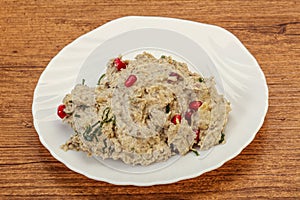 Vagan dietary cusine - mutabal with granet seeds