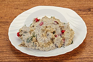 Vagan dietary cusine - mutabal with granet seeds