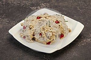 Vagan dietary cusine - mutabal with granet seeds