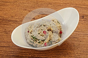 Vagan dietary cusine - mutabal with granet seeds