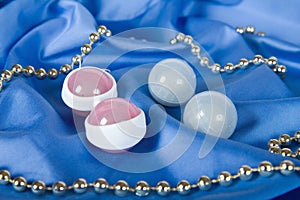 Vaginal balls on fabric photo