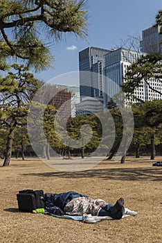 Vagrants in a park in the Nijubashimae district of Tokyo,