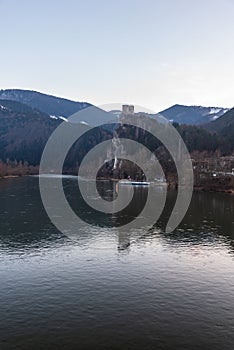 Vah river with Strecno castle ruins and hills of Mala Fatra mountains above in Slovakia