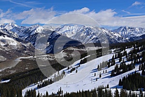 Vail, Colorado ski resort in winter with the snow covered Rocky Mountains photo
