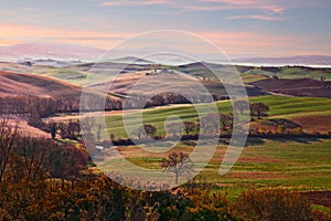 Val d`Orcia, Siena, Tuscany, Italy: landscape at sunrise of the countryside