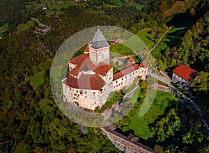 Val Isarco, Italy - Aerial panoramic view of Trostburg Castle, a XII century fortress at the Italian Dolomites photo