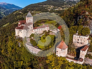 Val Isarco, Italy - Aerial view of Trostburg Castle, a XII century fortress at the Italian Dolomites on a sunny autumn day photo