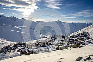 View of the Val Thorens ski resort of Three Valleys, France. Mountains covered with snow