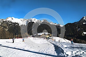 Valbona, Moena, Trentino Alto Adige, Italy, Alps, Dolomiti- December 24, 2017: Ski resort.Ski slopes.Sunny day at the ski resort.