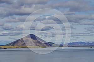 Valcano mount and lake in Myvatn Winter landscape